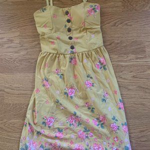Yellow sundress with pink flowers